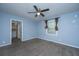 Bedroom featuring a ceiling fan, gray walls, a window, and gray carpet at 1121 Inverness Ln, Hanahan, SC 29410