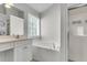 Bright bathroom featuring a soaking tub, vanity and walk-in shower at 1158 Peninsula Cove Dr, Charleston, SC 29492