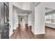 Welcoming entryway with beautiful wood-look floors and neutral paint, creating a bright and inviting space at 1158 Peninsula Cove Dr, Charleston, SC 29492
