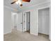 Hallway with multiple doors and closet at 1158 Peninsula Cove Dr, Charleston, SC 29492