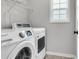 Laundry room featuring modern washer and dryer at 1158 Peninsula Cove Dr, Charleston, SC 29492