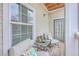 Cozy balcony seating area with overhead coverage at 1300 Park West Blvd # 517, Mount Pleasant, SC 29466