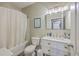 Bathroom features a shower-tub combo with white vanity and modern sink at 1300 Park West Blvd # 517, Mount Pleasant, SC 29466