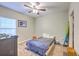 Cozy bedroom with a ceiling fan, natural light, and closet at 1300 Park West Blvd # 517, Mount Pleasant, SC 29466