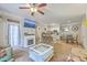 Open-concept living room flows seamlessly into the dining and kitchen area at 1300 Park West Blvd # 517, Mount Pleasant, SC 29466