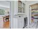 Convenient butler pantry between kitchen and dining with storage and serving space at 1300 S Main St, Summerville, SC 29483