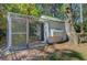 A chicken coop stands in the backyard of this property at 1300 S Main St, Summerville, SC 29483