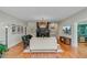 Elegant living room with hardwood floors, fireplace, chandelier, and comfortable seating at 1300 S Main St, Summerville, SC 29483