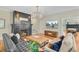 Elegant living room with hardwood floors, fireplace, chandelier, and comfortable seating at 1300 S Main St, Summerville, SC 29483