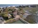 Overhead capture showcasing waterfront homes with docks and serene water views, exemplifying coastal living at its finest at 1504 Forrest Ave, Folly Beach, SC 29439