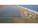 Breathtaking aerial view of a waterfront community with docks, showcasing serene coastal living and private waterfront access at 1504 Forrest Ave, Folly Beach, SC 29439