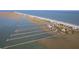 Expansive community view featuring homes with docks along waterfront, with stunning coastal beauty and exclusive waterfront access at 1504 Forrest Ave, Folly Beach, SC 29439