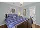 This bedroom offers a window and quaint nautical-themed décor and furnishings at 1504 Forrest Ave, Folly Beach, SC 29439
