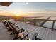 Relax with sunset views and drinks on this inviting deck complete with comfortable seating and marsh vistas at 1504 Forrest Ave, Folly Beach, SC 29439