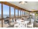 Bright and airy screened dining area offers scenic views of the waterway and beyond at 1504 Forrest Ave, Folly Beach, SC 29439