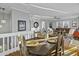 Dining room with hardwood floors leads to the living room at 1504 Forrest Ave, Folly Beach, SC 29439