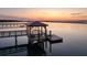 Picturesque dock pavilion overlooking calm waters at sunset, offering tranquility and scenic views at 1504 Forrest Ave, Folly Beach, SC 29439