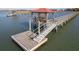 Charming dock featuring a gazebo extends into the waterway with a convenient boat launch at 1504 Forrest Ave, Folly Beach, SC 29439