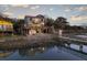 Waterfront home with an expansive deck, dock, and tranquil water views offering the ultimate coastal living experience at 1504 Forrest Ave, Folly Beach, SC 29439
