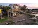 Beautiful elevated home with a spacious deck and a screened-in porch offers serene views at 1504 Forrest Ave, Folly Beach, SC 29439