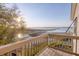 Scenic view of the pier and marshlands from the deck at 1504 Forrest Ave, Folly Beach, SC 29439