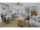 Inviting living room with comfortable seating, a cozy rug, and a view to the outdoor patio at 1504 Forrest Ave, Folly Beach, SC 29439
