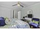Comfortable main bedroom with plenty of natural light, ceiling fan and ensuite access at 1504 Forrest Ave, Folly Beach, SC 29439