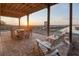 Covered outdoor dining with scenic water views at 1504 Forrest Ave, Folly Beach, SC 29439