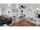 Spacious living room featuring hardwood floors, a ceiling fan, and ample natural light at 1617 Balsam St, Charleston, SC 29407