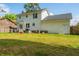 Large backyard with a lawn at 184 Ponderosa Dr, Ladson, SC 29456