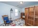 bedroom with a fun vehicle rug, vintage desk, rocking chair, and wood loft bed at 184 Ponderosa Dr, Ladson, SC 29456
