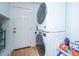 Modern laundry room featuring a stacked washer and dryer at 184 Ponderosa Dr, Ladson, SC 29456