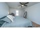 Spacious bedroom with a ceiling fan, a neutral color palette, and laminate flooring at 184 Ponderosa Dr, Ladson, SC 29456