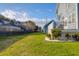 Expansive backyard featuring lush green grass and mature landscaping at 2107 Military Way, Charleston, SC 29414