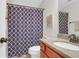 Bathroom featuring a sink with granite counter top and a shower with patterned curtain at 2107 Military Way, Charleston, SC 29414