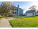 Beautiful two-story home with a well-maintained lawn and detached garage with a basketball hoop at 2107 Military Way, Charleston, SC 29414