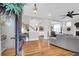 Inviting foyer leads to an open living area with hardwood floors and abundant natural light at 2107 Military Way, Charleston, SC 29414
