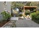 The backyard features a firepit, patio, pergola, and lush landscaping at 2187 Annie Laura Ln, Mount Pleasant, SC 29466