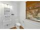 Clean, white bathroom with charming fixtures and wainscoting at 2187 Annie Laura Ln, Mount Pleasant, SC 29466