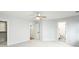 Bright bedroom featuring neutral carpet, ceiling fan, and access to a bathroom at 2187 Annie Laura Ln, Mount Pleasant, SC 29466