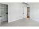 Bright bedroom with neutral walls, carpet, and closet with shelves at 2187 Annie Laura Ln, Mount Pleasant, SC 29466