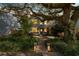 Charming two-story home with inviting brick pathway, lush landscaping, and mature tree at 2187 Annie Laura Ln, Mount Pleasant, SC 29466