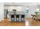 Modern kitchen featuring white cabinets, granite countertops, subway tile backsplash, and stainless steel appliances at 2187 Annie Laura Ln, Mount Pleasant, SC 29466