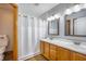 Bathroom featuring a double sink vanity with a shower curtain and a modern design at 220 New Oak Ln, Moncks Corner, SC 29461