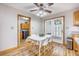 Dining area featuring a wood ceiling fan and a view into the laundry room at 220 New Oak Ln, Moncks Corner, SC 29461