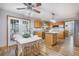 Eat-in kitchen with matching appliances, central island and view to backyard at 220 New Oak Ln, Moncks Corner, SC 29461