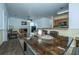 Open-concept dining area connecting to the living room and kitchen at 226 Killarney Trl, Moncks Corner, SC 29461
