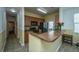 Functional kitchen with sleek countertops, black appliances, and ample storage space at 226 Killarney Trl, Moncks Corner, SC 29461