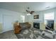 Cozy living room features a fireplace, ceiling fan, and comfortable seating at 226 Killarney Trl, Moncks Corner, SC 29461
