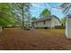 Spacious backyard showcasing a patio with furniture and a well-maintained lawn at 234 Lipman St, Summerville, SC 29483